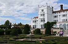 Topiary gardens and the south face of the hotel Danesfield-house.jpg