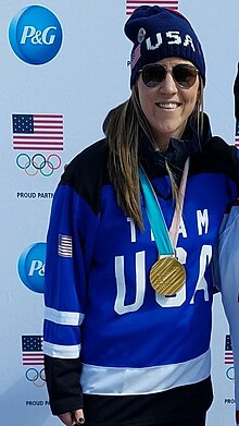 Meghan Duggan with 2018 gold medal at an appearance in Quincy, MA Duggan Gold Medal.jpg