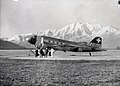 Passengers in front of Douglas DC-3-227A, HB-IRO with neutrality livery at Locarno-Magadino