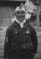A kamikaze pilot wearing a plain hachimaki