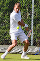 Enzo Couacaud competing in the first round of the 2015 Wimbledon Qualifying Tournament at the Bank of England Sports Grounds in Roehampton, England. The winners of three rounds of competition qualify for the main draw of Wimbledon the following week.