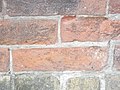 Eroded bricks sw corner of front and frederick, 2013 02 18 -ae.JPG - panoramio.jpg
