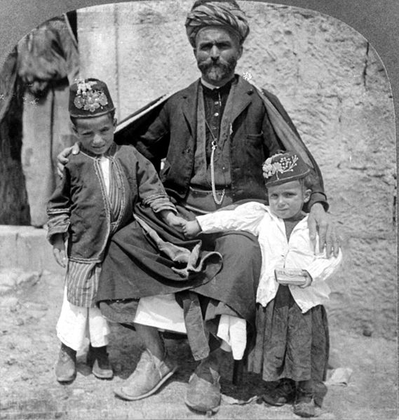 File:Father and children, showing costumes, Ramallah, Palestine.JPG