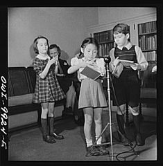 First-grade pupils having their voices recorded for diction correction