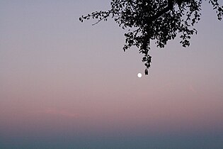 A full Moon rising, seen through the Belt of Venus and from near Linz, Austria