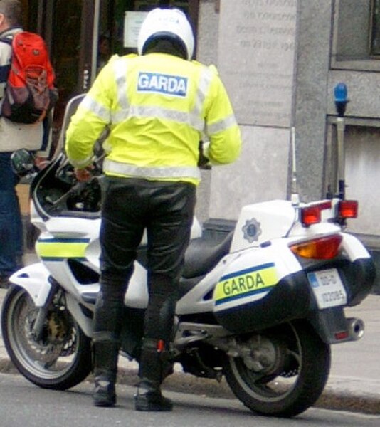 A member of the Garda Síochána with motorcycle