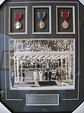 Thumbnail for File:George W Brain personal medals framed.jpg