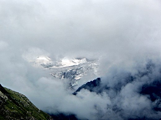 Glimpse of Nanda Devi amidst the clouds from Valley of Flowers.jpg