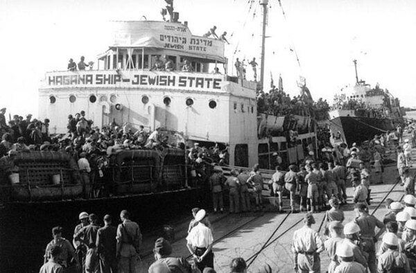 Haganah ship Jewish State carrying illegal Jewish immigrants from Europe at the Haifa Port, Mandatory Palestine, 1947