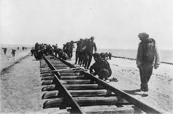 Workers laying tracks for the Hejaz Railway near Tabuk, 1906