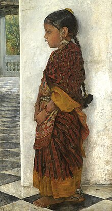 Hermann Linde - Girl standing in a veranda wearing a Pochampalli sari (ca.1895).jpg