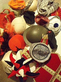 Headgear Any covering for the head; element of clothing which is worn on ones head