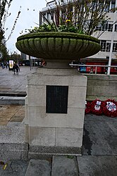 A planter and plaque installed in 2013 at the Kingston upon Hull Cenotaph on Remembrance Sunday 2023. The plaque features a quote attributed to Andrew Marvell as well as the quote "Their name liveth forever more".