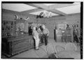 INTERIOR VIEW OF SALOON SHOWING ROSEWOOD BAR FROM THE CHAMBORDEN SALOON AND (LEFT TO RIGHT) EDDIE KEY, MARJORIE WHITE AND HAROLD CORRY - Corry Homestead, Southern Museum of HABS ALA,64-OAK,1B-2.tif