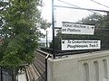 Back on the North Buckhout Street Bridge, where one sign tells you where to go to Poughkeepsie, and the other one tells you where to get tickets.