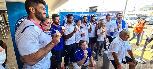 The Israel national judo team members, wearing their bronze medals from the 2020 Summer Olympics Mixed Team event in 2021 Israel National Olympic Judo Mixed Team in 2021.jpg