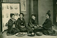 Japanese over a cup of tea. Before 1902.jpg