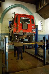 A Land Rover has its chassis inspected as part of its MOT. The vehicle structure is among many of the points covered in a MOT test. Land Rover Series IIA MOT test.JPG