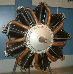 An 80 horsepower (60 kW) rated Le Rhone 9C, a typical rotary engine of WWI. The copper pipes carry the fuel-air mixture from the crankcase to the cylinder heads acting collectively as an intake manifold. Le Rhone 9C.jpg