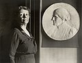 Leila Usher with bas-relief of Susan B. Anthony.jpg