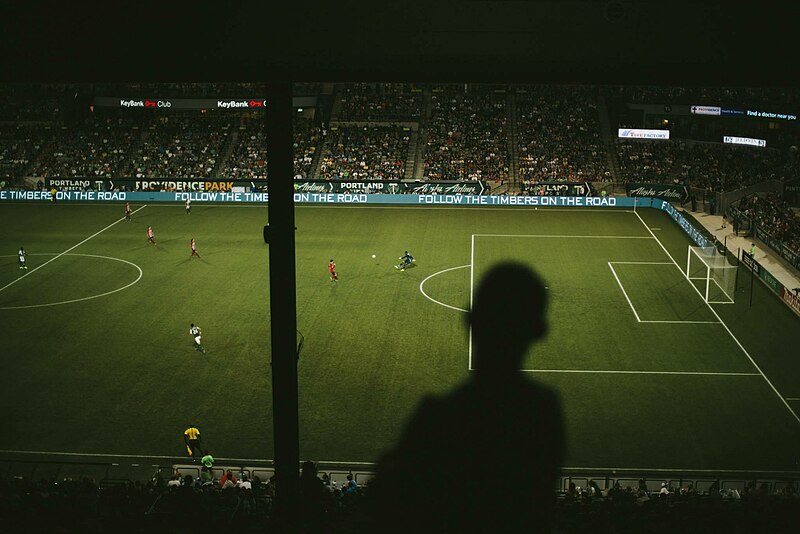 File:Man watching Timbers match.jpg