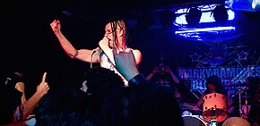 Graves performing with Marky Ramone's Blitzkrieg in 2010 Marky Ramone,Michale Graves (4640201605).jpg