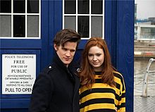 Matt Smith and Karen Gillian in front of the TARDIS