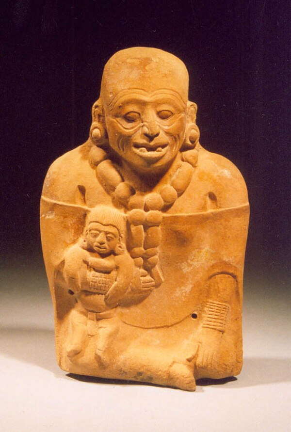 Ancient woman with child, art from the Maya or Jaina dating to the 7th-10th century, at the museum