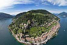 Aerial view of Morcote and its vineyards on the top of the hill. Note the abandoned vineyards in the center just above town. Morcote Aerial.jpg