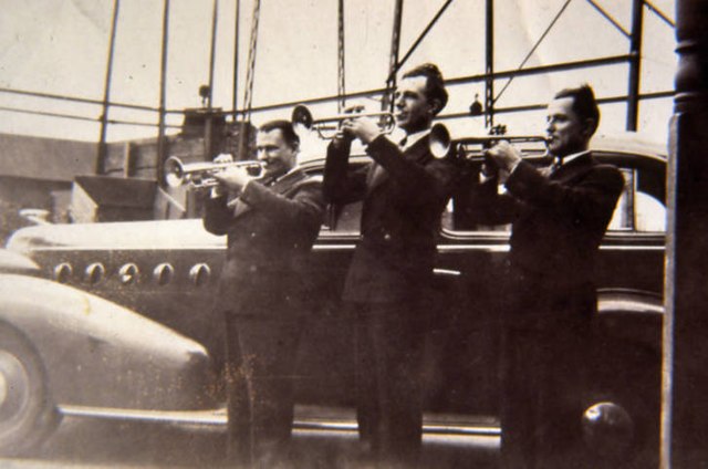 Trio of trumpeters in Toledo, Ohio, approximately 1920