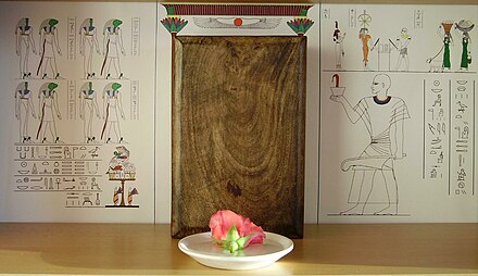 A Kemetic altar with a small offering