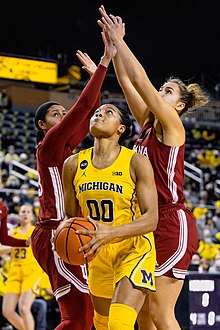 Hillmon under the basket in a 2022 game against the Indiana Hoosiers. Naz Hillmon of the Michigan Wolverines Women's Basketball Team.jpg