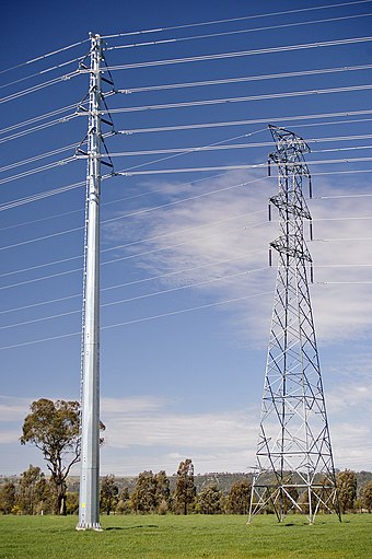 Steel tube tower next to older lattice tower near Wagga Wagga, Australia