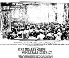 Los Angeles Times coverage of Zellerbach fire, 1909. Drawing at the left shows fireman Oscar Jones escaping from the flames by way of a fire hose Newspaper clipping showing crowd of thousands witnessing fire in Los Angeles, California, in 1909.png