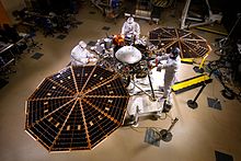 The InSight lander with solar panels deployed in a cleanroom PIA19664-MarsInSightLander-Assembly-20150430.jpg