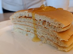 Pancake stack cut on half with honey 2.jpg