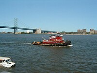 Tugboat off Penn's Landing, near the foot of the Benjamin Franklin Bridge. Penns landing area.jpg