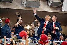 U.S. President Donald J. Trump waves to the crowd. President Trump at the World Series Game (48975694762).jpg