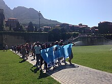 Students from the University of Cape Town marching to the local police station on Tuesday 20 October 2015 to demand the release of other students arrested the night before. Second day of the FeesMustFall protests at the University of Cape Town 04.JPG