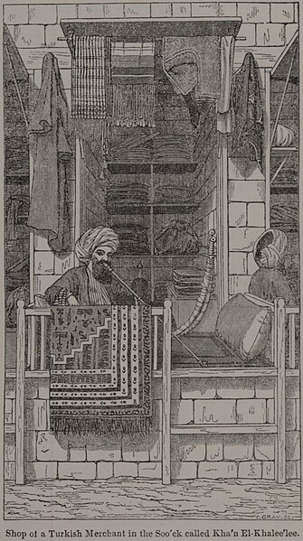 File:Shop of a Turkish Merchant in the Soo'ck called Kha'n El-Khalee'lee. (1836) - TIMEA.jpg