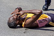 Lemma lies on the ground after finishing the race