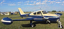 Cessna 310D with early rounded nose, swept-back vertical stabilizer and "tuna" style wingtip fuel tanks Songbird III.jpg