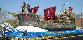 Krewe group of dancers in a carnival parade