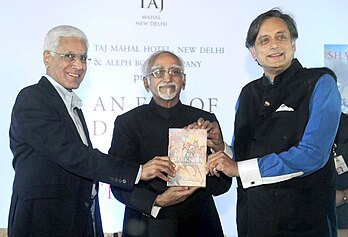 The Vice President, Shri M. Hamid Ansari releasing the book titled 'An Era of Darkness The British Empire in India', authored by Dr. Shashi Tharoor, in New Delhi on November 04, 2016.jpg