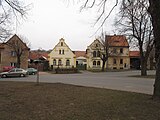 Čeština: Žlutý dům v Tuchořicích. Okres Louny, Česká republika. English: Yellow house in Tuchořice village, Louny District, Czech Republic.