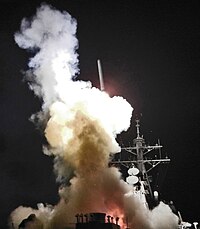 USS Barry (DDG-52) launching a Tomahawk missile in support of Operation Odyssey Dawn - Cropped
