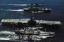Ships of the 7th Fleet replenishing off Vietnam in May 1969: (from front to back) Wiltsie, Tappahannock, Oriskany, Mars and Perkins. USS Oriskany (CVA-34) and destroyers being replenished off Vietnam 1969.jpg