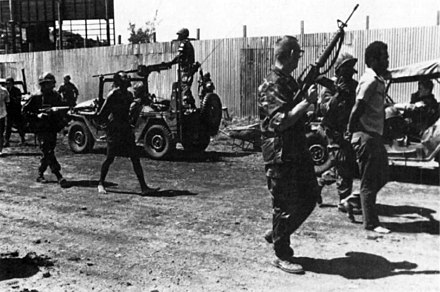 American troops take suspected members of the Grenadian People's Revolutionary Army in 1983.