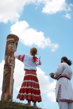 Ukrainian Rodnovers worshipping a kapy (pole) of Perun, in Ternopil Oblast, Ukraine. Ukrainian Rodnovers worshipping Perun in Ternopil Oblast, Ukraine.png