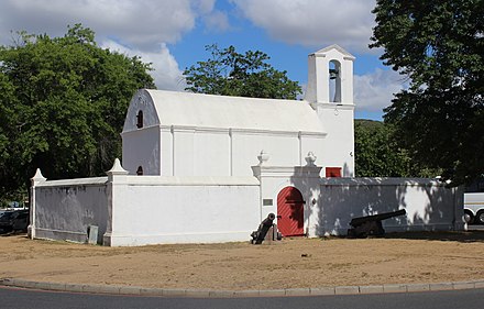 The Stellenbosch Powder House, dating from 1776 or 1777, surrounded by the oaks for which the city is famous.